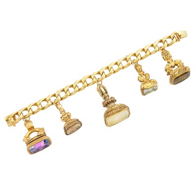 Lot 311 - Gold and Silver-Gilt Seal Fob Charm Bracelet