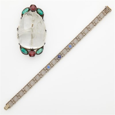 Lot 1789 - White Gold and Synthetic Sapphire Bracelet and Silver, Carved Paste and Cabochon Emerald Brooch