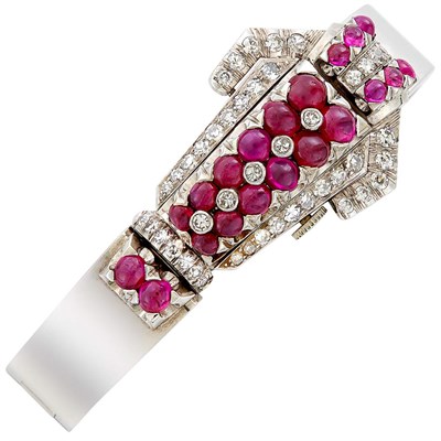Lot 253 - Rhodium-Plated Gold, Cabochon Ruby and Diamond Bangle-Watch
