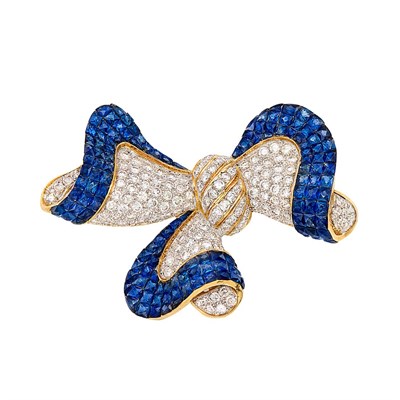 Lot 313 - Two-Color Gold, Invisibly-Set Sapphire and Diamond Bow Brooch