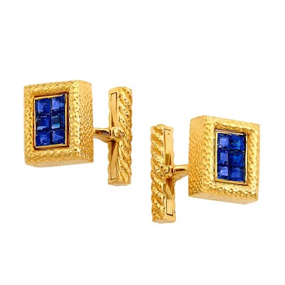 Lot 191 - Pair of Hammered Gold and Invisibly-Set Sapphire Cufflinks, David Webb