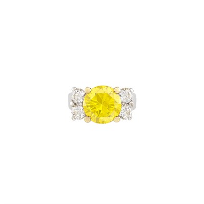 Lot 68 - Platinum, Gold, Treated Yellow Diamond and Diamond Ring