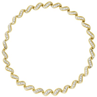 Lot 380 - Pair of Two-Color Gold and Diamond Bracelets/ Necklace Combination