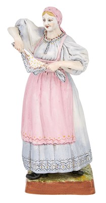 Lot 161 - Russian Porcelain Figure of a Peasant Woman...