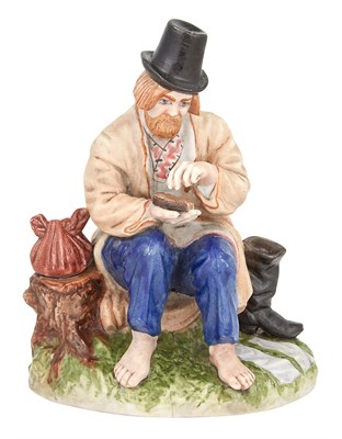Lot 167 - Russian Porcelain Figure of a Peasant Man...