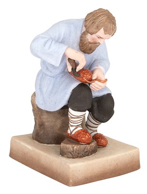 Lot 165 - Russian Porcelain Figure of a Bast Shoemaker...