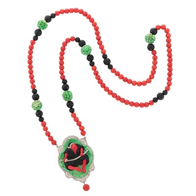 Lot 328 - Long Coral, Carved Jade and Black Onyx Bead and Diamond Pendant-Necklace