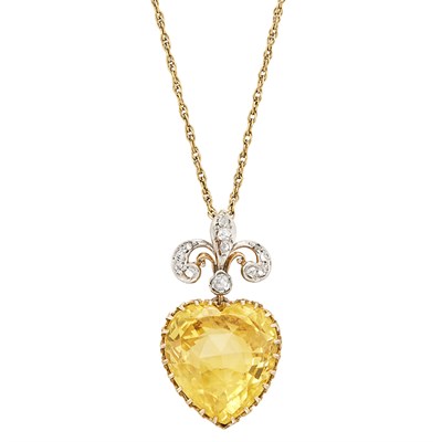 Lot 391 - Edwardian Platinum-Topped Gold, Yellow Sapphire and Diamond Fleur-de-lys Heart Pendant, Black Starr & Frost