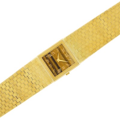 Lot 16 - Gold and Tiger's Eye Wristwatch, Piaget