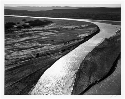 Lot 176 - ADAMS, ANSEL (1902-1984) Sand Bar, Rio Grande,...