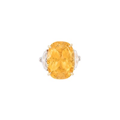 Lot 390 - Platinum, Gold, Orangy Yellow Sapphire and Diamond Ring