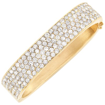 Lot 257 - Gold and Diamond Bangle Bracelet