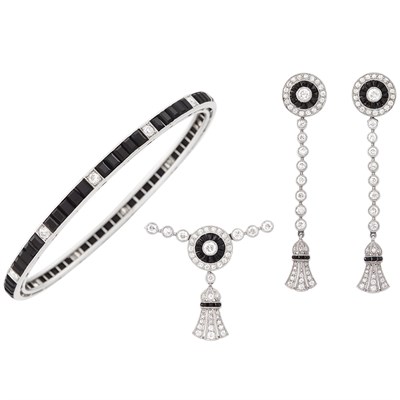 Lot 311 - Art Deco Platinum, Black Onyx and Diamond Bangle Bracelet, J.E. Caldwell & Co., Pair of Pendant-Earclips and Fragment