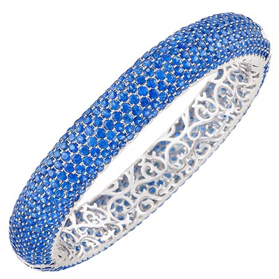 Lot 174 - White Gold and Sapphire Bangle Bracelet