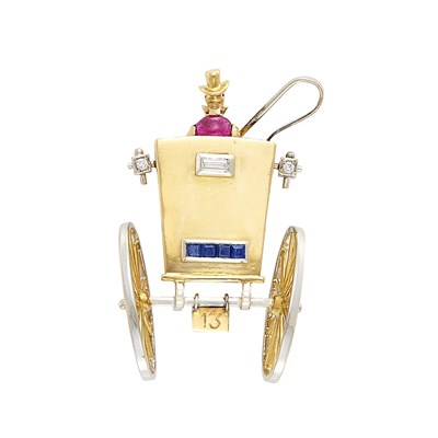 Lot 318 - Two-Color Gold, Diamond, Ruby and Sapphire Carriage Clip-Brooch