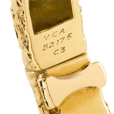 Lot 444 - Gold, Platinum, Diamond and Black Onyx Bangle Bracelet, Van Cleef & Arpels, France