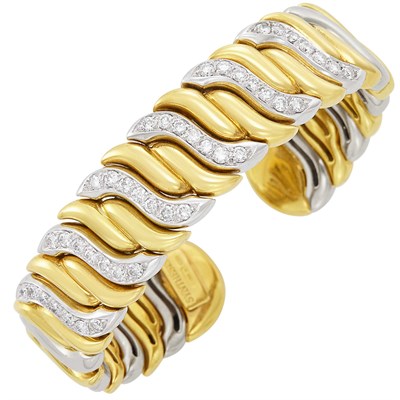 Lot 389 - Two-Color Gold and Diamond Bangle Bracelet