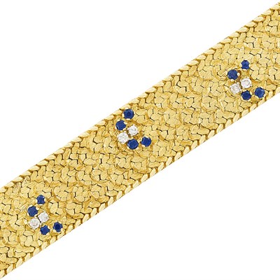 Lot 221 - Two-Color Gold, Diamond and Sapphire Bracelet