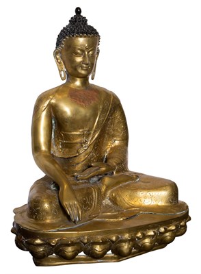 Lot 216 - Tibetan Gilt-Bronze Figure of a Seated Buddha...
