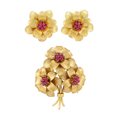 Lot 344 - Pair of Gold and Ruby Flower Earclips and Brooch, Tiffany & Co.