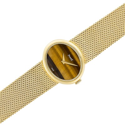 Lot 62 - Gold and Tiger's Eye Wristwatch, Piaget