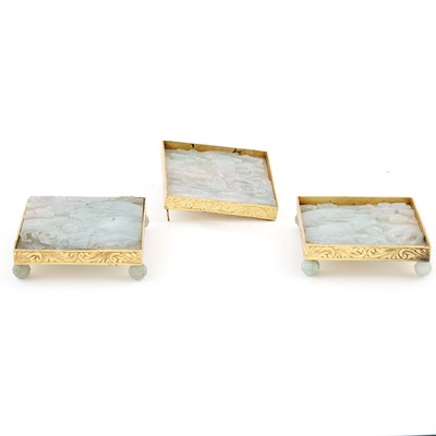 Lot 410 - Three Chinese Gilt-Metal Mounted Jadeite...