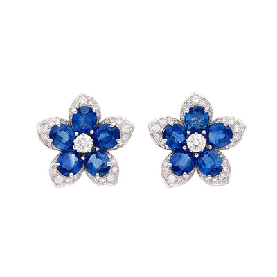 Lot 173 - Pair of White Gold. Sapphire and Diamond Flower Earclips