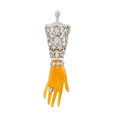 Lot 145 - White Gold, Carved Amber and Diamond Hand Pendant-Brooch, Nardi