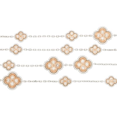Lot 133 - Long Two-Color Gold and Diamond Chain Necklace