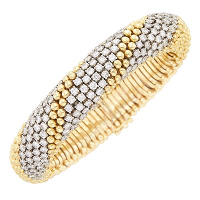 Lot 438 - Two-Color Gold and Diamond Bracelet