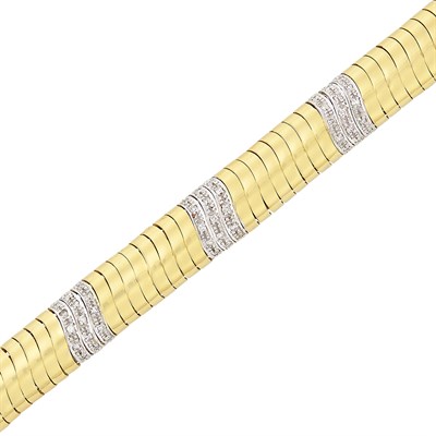 Lot 512 - Two-Color Gold and Diamond Bracelet