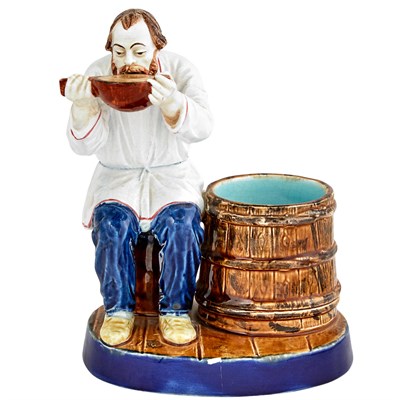Lot 123 - Russian Glazed Pottery Figure of a Peasant...
