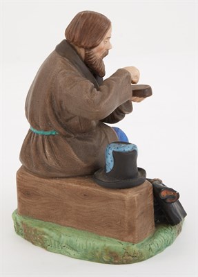 Lot 119 - Russian Porcelain Figure of a Peasant Man...