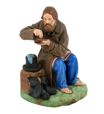 Lot 119 - Russian Porcelain Figure of a Peasant Man...