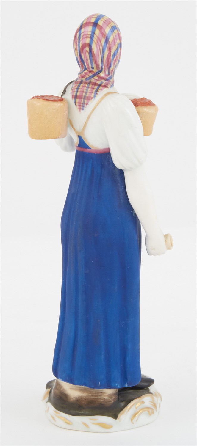 Lot 120 - Russian Porcelain Figure of a Peasant Woman...