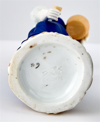 Lot 120 - Russian Porcelain Figure of a Peasant Woman...