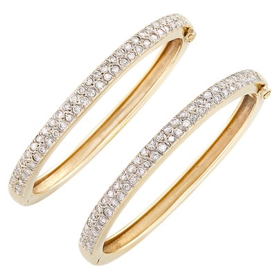 Lot 455 - Pair of Gold and Diamond Bangle Bracelets