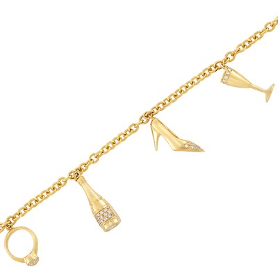 Lot 558 - Gold and Diamond Charm Bracelet