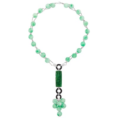Lot 397 - Double Strand Jade Bead, White Gold, Black Onyx, Carved Jade and Diamond Pendant-Necklace