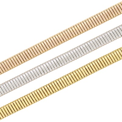 Lot 267 - Three Tricolor Gold Snake Link Bracelets