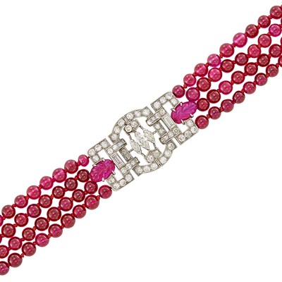 Lot 239 - Four Strand Synthetic Ruby Bead, Platinum and Diamond Bracelet