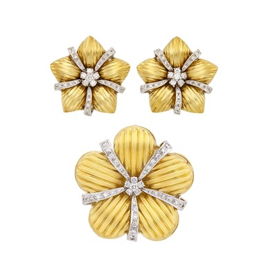 Lot 226 - Pair of Two-Color Gold and Diamond Flower Earclips and Pendant-Brooch