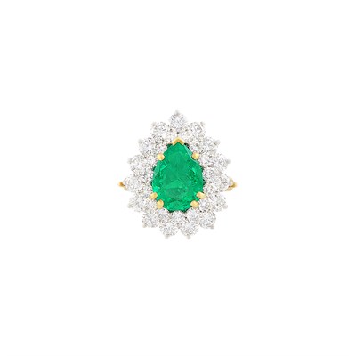 Lot 50 - Platinum, Gold, Emerald and Diamond Ring