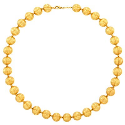 Lot 229 - Gold Melon Bead Necklace