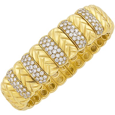 Lot 659 - Gold and Diamond Bangle Bracelet
