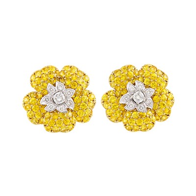 Lot 509 - Pair of Two-Color Gold, Yellow Sapphire and Diamond Flower Earclips