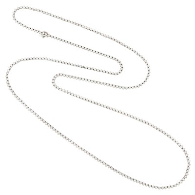 Lot 288 - Long White Gold and Diamond Necklace