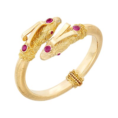 Lot 335 - Gold and Ruby Eagle Head Bangle Bracelet