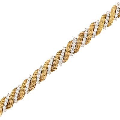 Lot 214 - Two-Color Gold and Diamond Bracelet