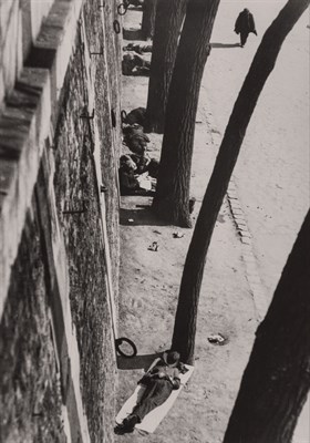 Lot 106 - KERTÉSZ, ANDRÉ (1894-1985) [The Tramps Siesta,...